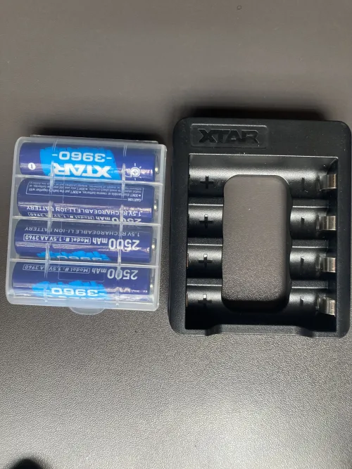 XTAR C4-AA USB-C Charger Bundle with 4pcs × 1.5V 2500mAh Lithium AA Batteries actual product photo.
