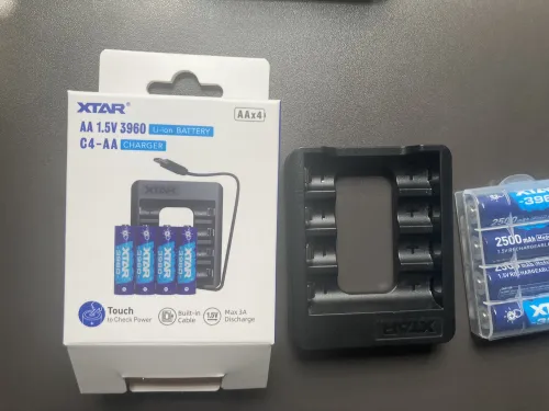 XTAR C4-AA USB-C Charger Bundle with 4pcs × 1.5V 2500mAh Lithium AA Batteries actual product photo.